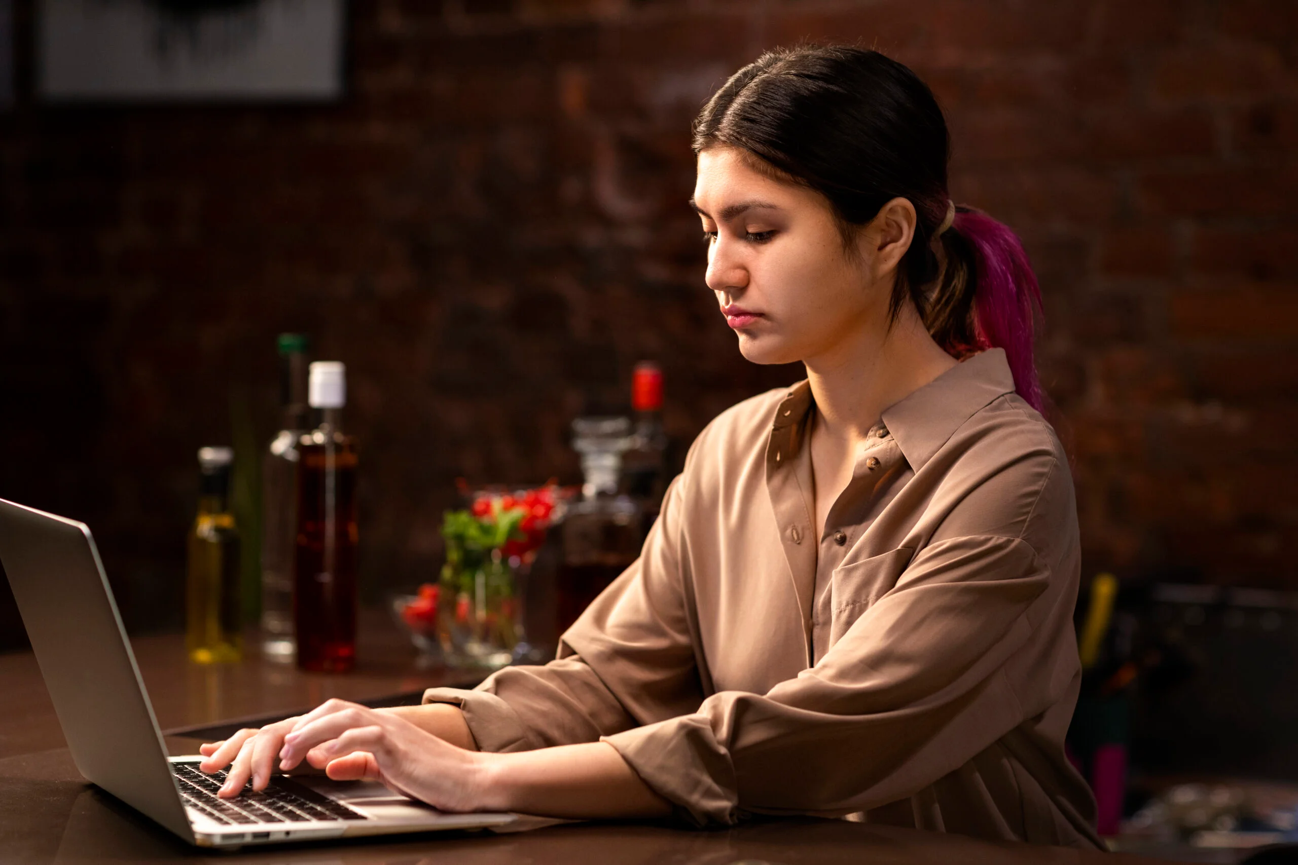 medium-shot-woman-working-with-laptop-1-scaled-1